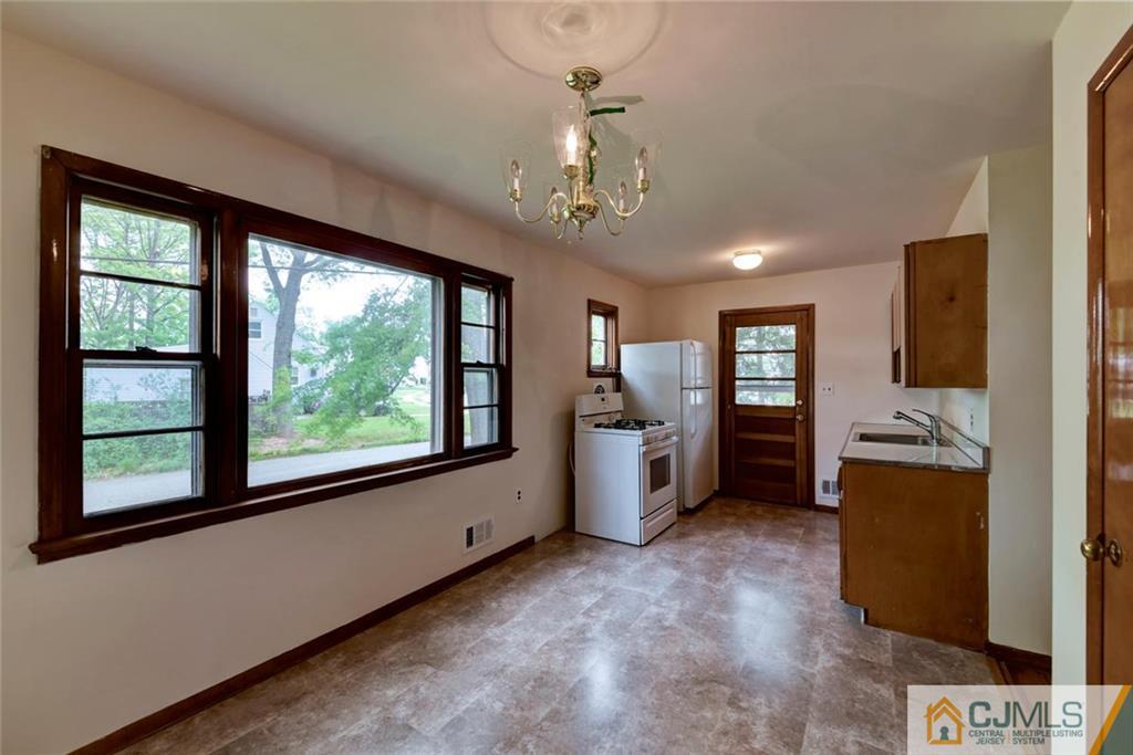 65 Long Hill Road Colonia, NJ 07067 - Photo 6 of 16 a very nice looking room with a large window