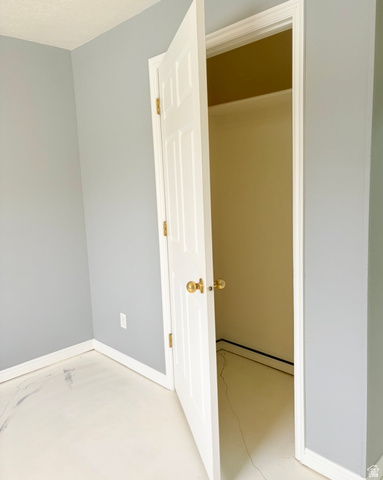 8116 North Ridge Loop West, Unit 8 Eagle Mountain, UT 84005 - Photo 15 of 23 Unfurnished bedroom with concrete flooring