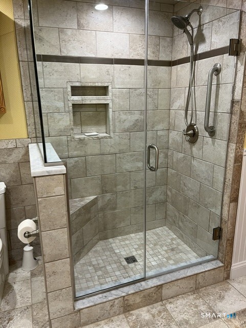 118 River Road Madison, CT 06443 - Photo 21 of 25 A lovely walk in shower.