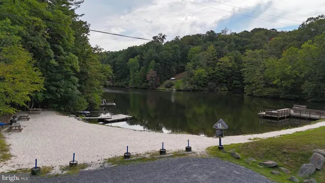 a lake view with a bench
