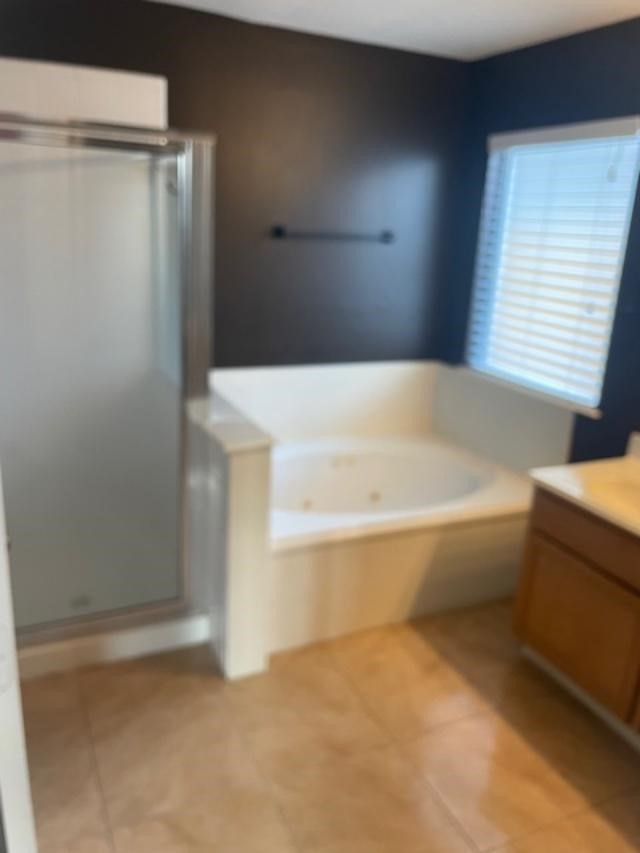 2219 Beacon Light Lane Fresno, TX 77545 - Photo 11 of 23 a bathroom with a bathtub and shower