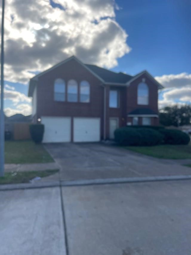 2219 Beacon Light Lane Fresno, TX 77545 - Photo 2 of 23 a view of a house with a yard