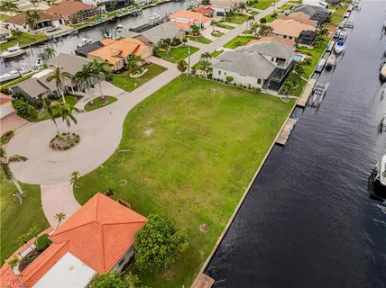 an aerial view of a pool patio swimming pool and outdoor seating