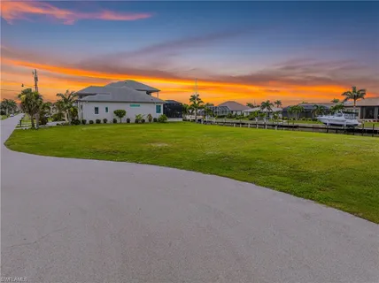 a swimming pool with chairs