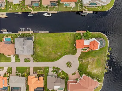 a view of a swimming pool with an ocean view