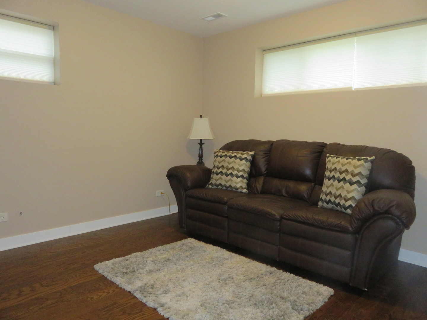 2441 Hawthorne Road Homewood, IL 60430 - Photo 11 of 23 a living room with a couch and a coffee table