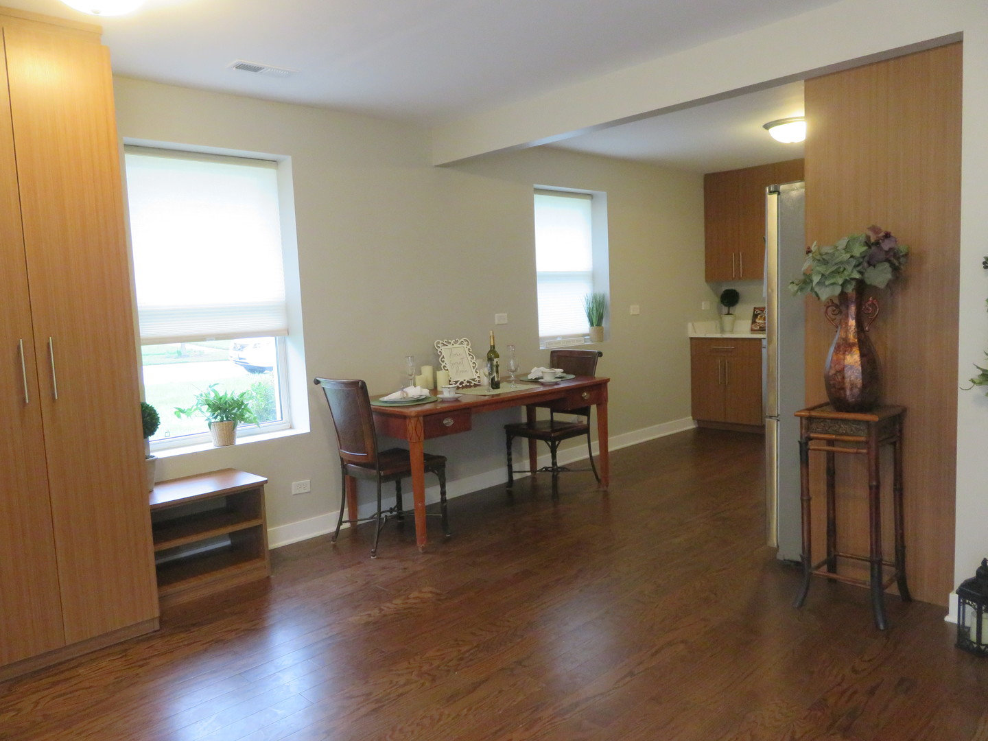 2441 Hawthorne Road Homewood, IL 60430 - Photo 8 of 23 a dining room with furniture and wooden floor