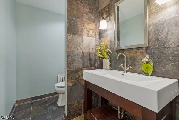 a bathroom with a sink and a toilet