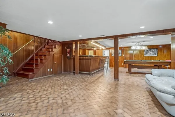 a view of an empty room with a fireplace
