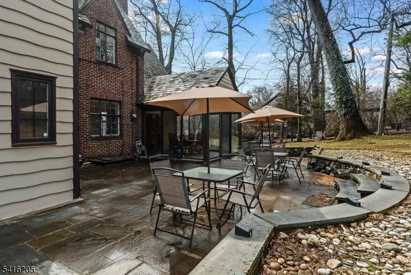 a view of a dinning tables and chairs in the patio