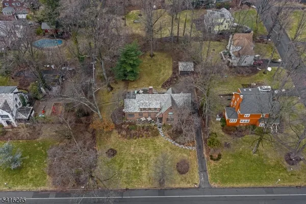 a view of a house with a back yard