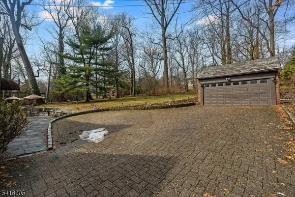 a aerial view of a house with a yard