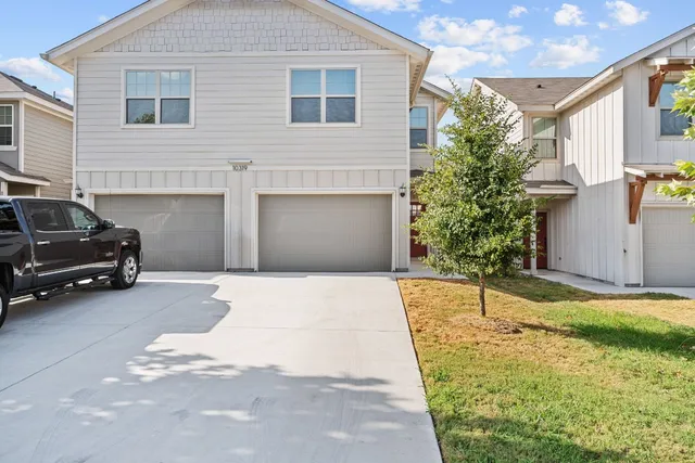 a house view with a backyard space