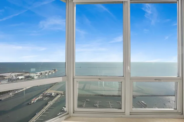 a view of a room with a large window