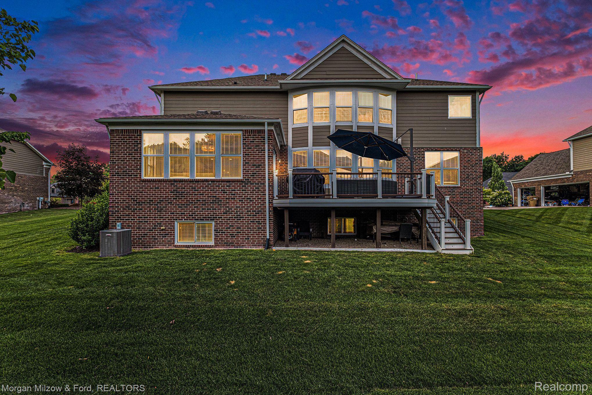 6941 Oakhurst Ridge Road Clarkston, MI 48348 - Photo 51 of 59 Rear elevation @ twilight