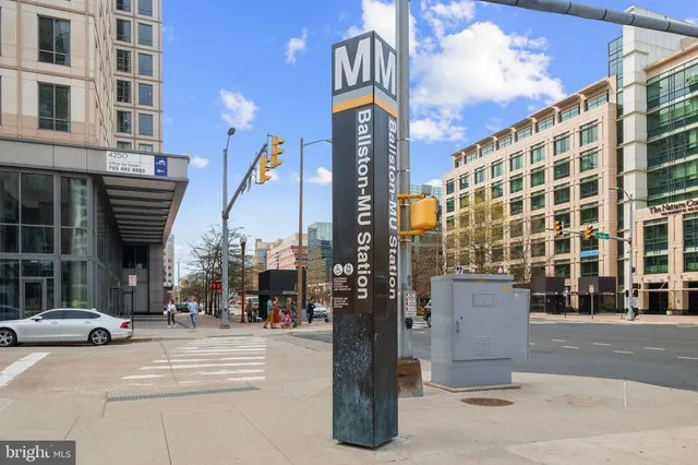 a city street with tall buildings