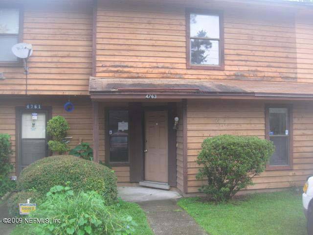 4763 Barnes Road South Jacksonville, FL 32207 - Photo 1 of 1 front view of a house with a yard
