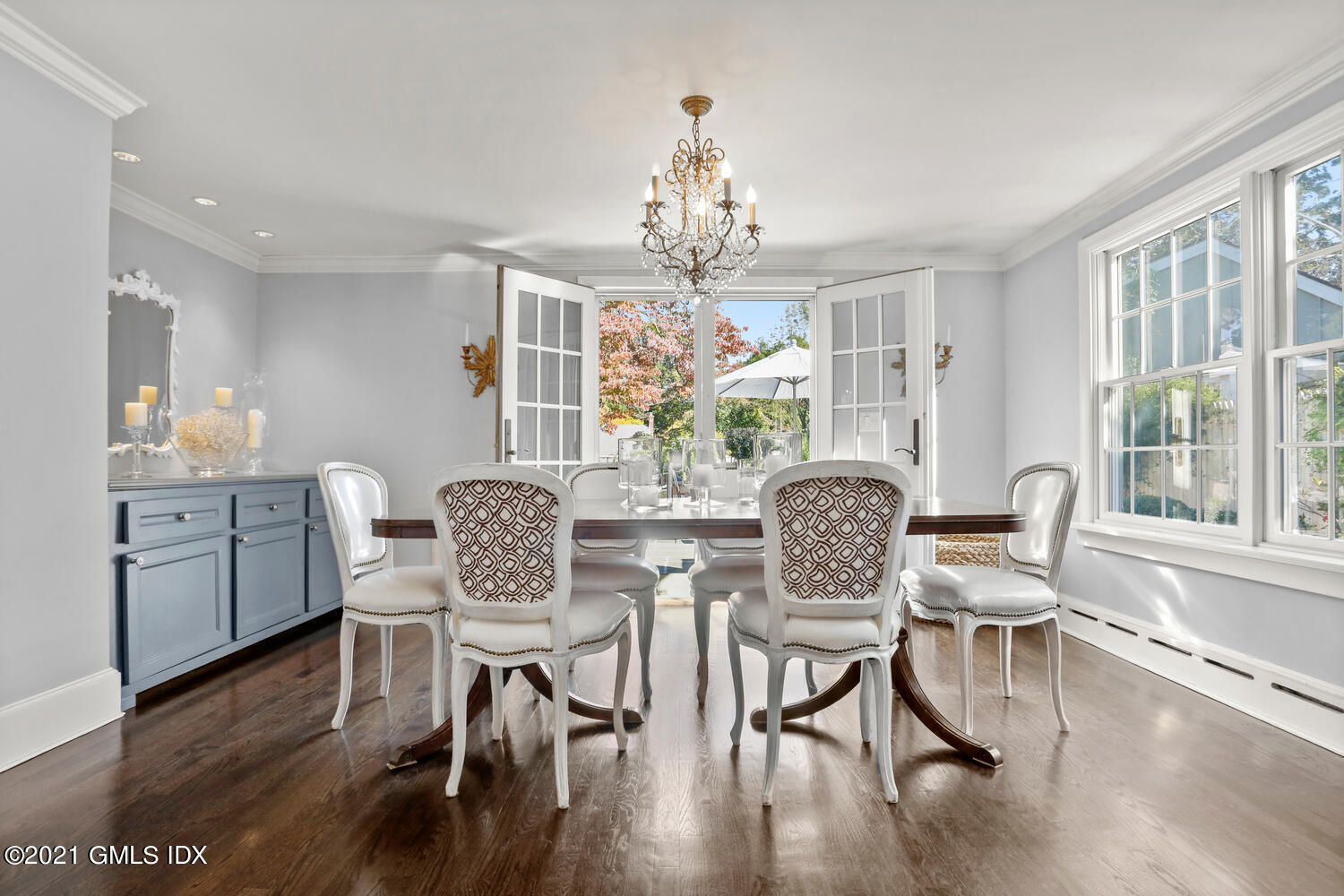 5 Manor Road Old Greenwich, CT 06870 - Photo 7 of 23 a view of a dining room with furniture window and wooden floor