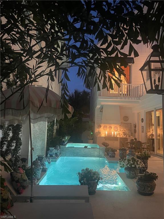 909 10th Avenue South Naples, FL 34102 - Photo 2 of 34 a front view of a house