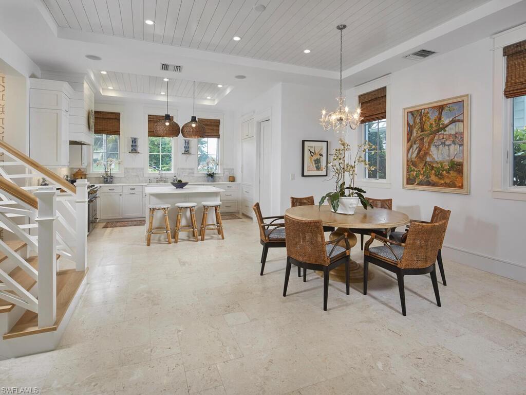 909 10th Avenue South Naples, FL 34102 - Photo 6 of 34 a view of a dining room with furniture