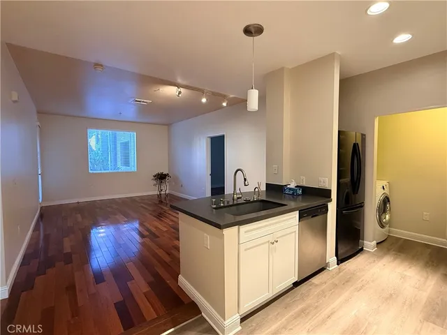 a view of kitchen and utility room
