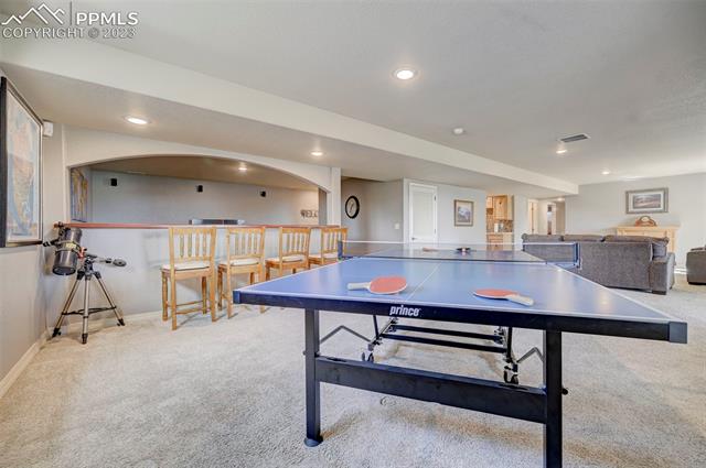 9470 Rockingham Drive Peyton, CO 80831 - Photo 23 of 39 Extra seating at the bar