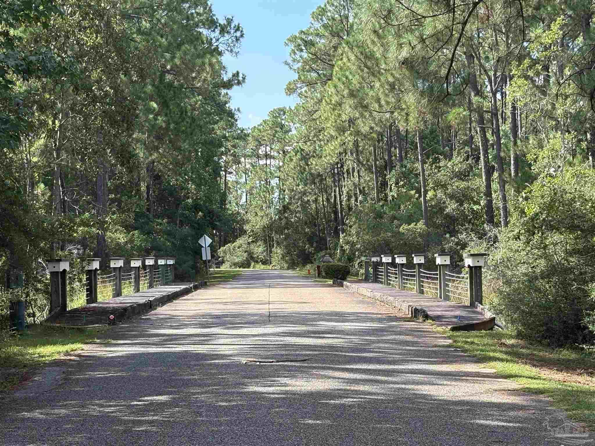 4568 Bayside Drive Milton, FL 32583 - Photo 12 of 13 a view of city with tall trees