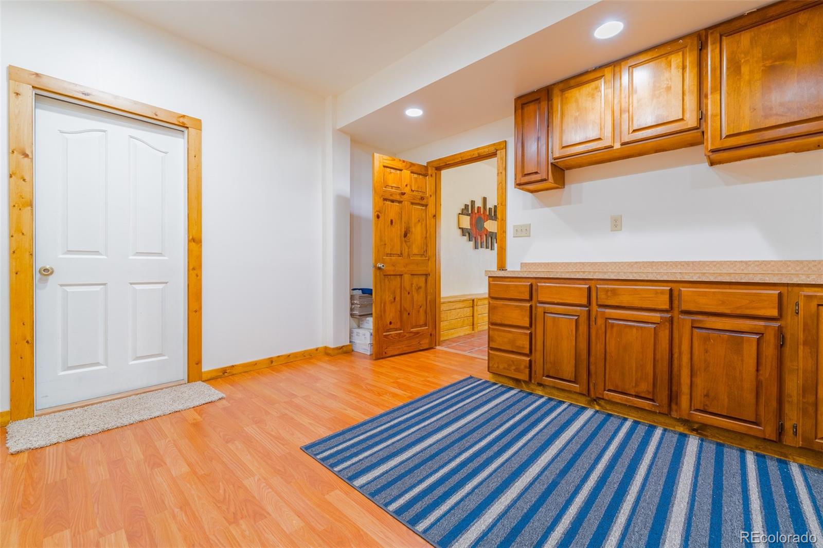 8221 Remington Road Como, CO 80432 - Photo 36 of 49 a view of an entryway with wooden floor