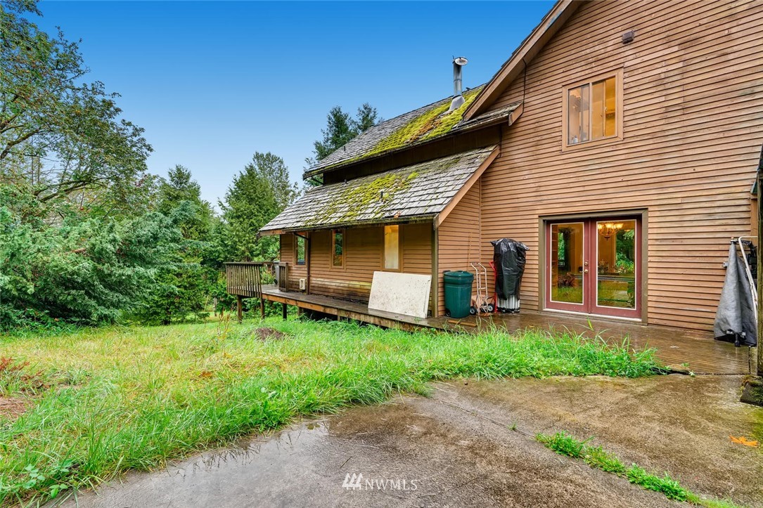 21612 High Bridge Road Monroe, WA 98272 - Photo 21 of 22 a front view of a house with a yard and porch