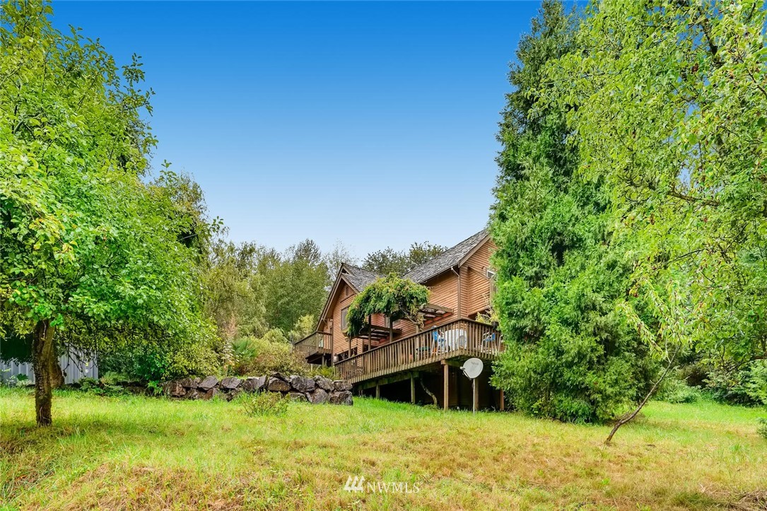 21612 High Bridge Road Monroe, WA 98272 - Photo 4 of 22 a view of a house with a yard