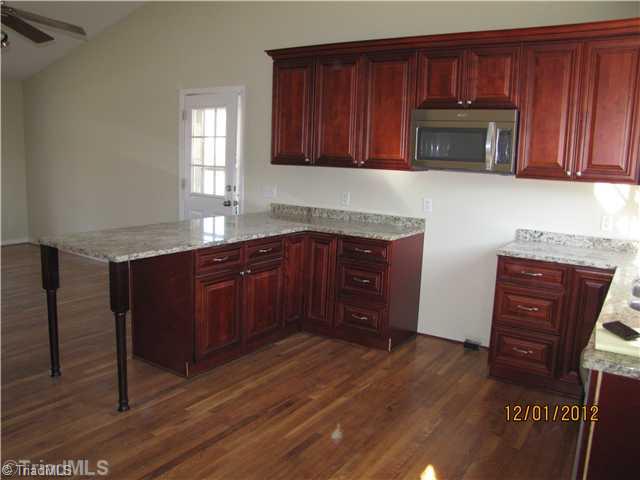 480 Helmstetler Road Lexington, NC 27295 - Photo 3 of 11 Kitchen. Tons of workspace and cabinets.