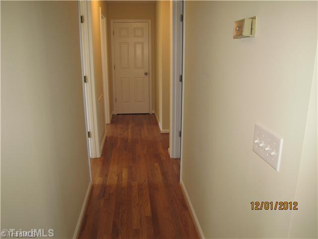 480 Helmstetler Road Lexington, NC 27295 - Photo 6 of 11 Other. Hallway, with Hardwoods leading to the bedrooms.