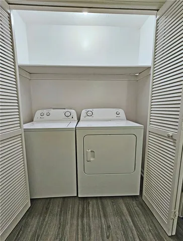a utility room with dryer and washer