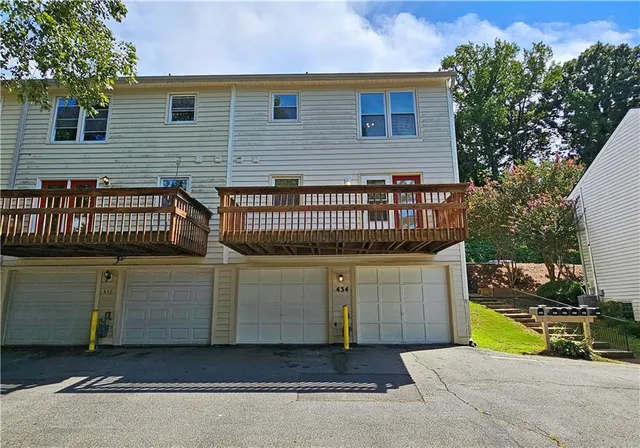 a view of a house with a garden