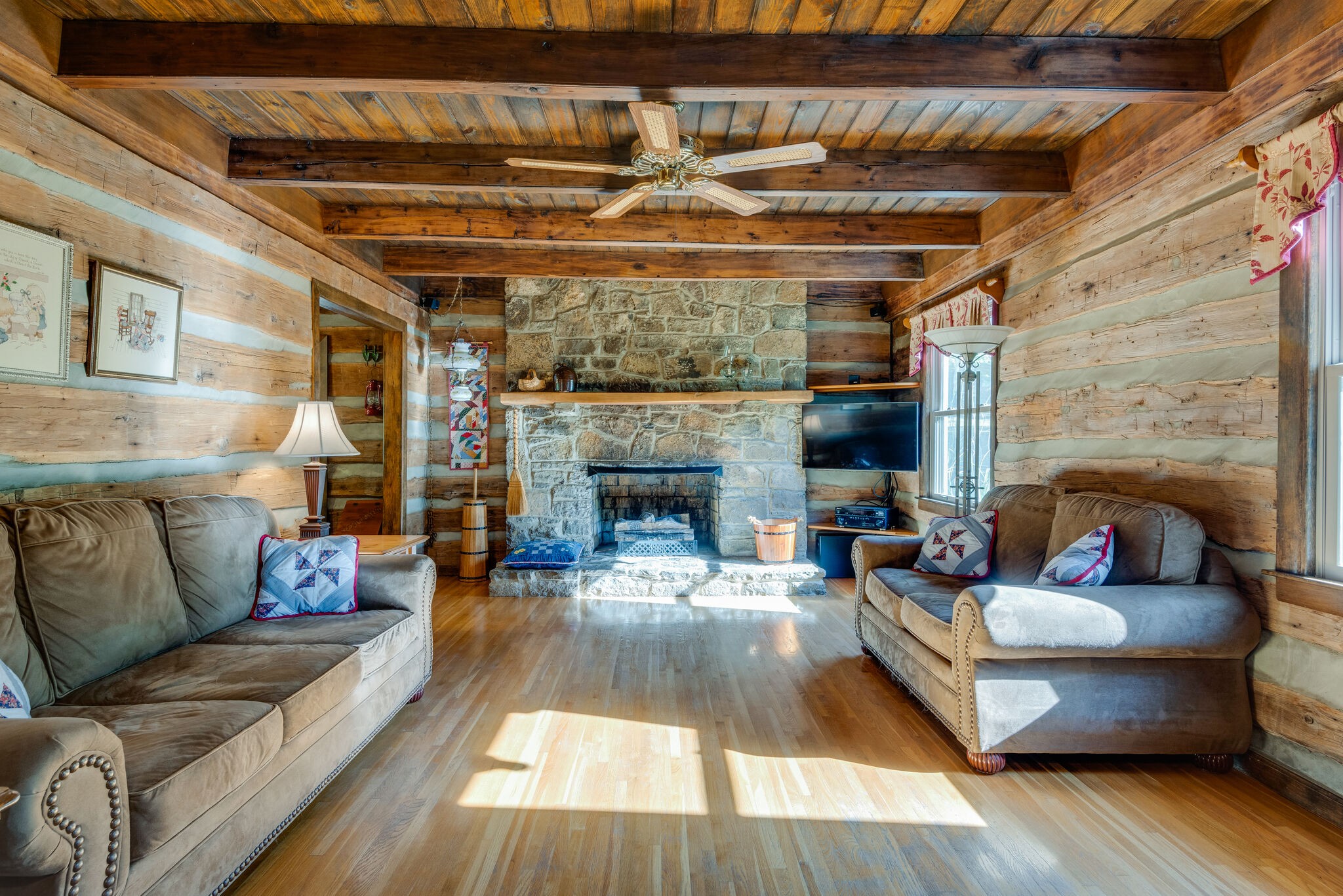 3093 Ivey Point Road Goodlettsville, TN 37072 - Photo 2 of 40 a living room with furniture and a fireplace