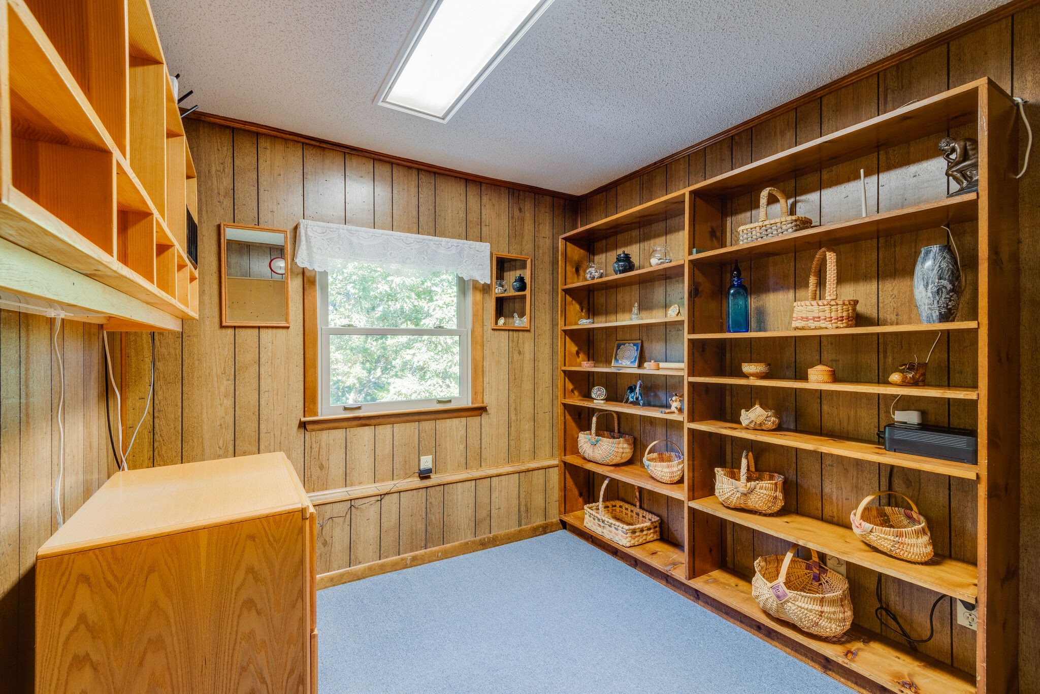3093 Ivey Point Road Goodlettsville, TN 37072 - Photo 26 of 40 a view of an empty room with a window and wooden walls