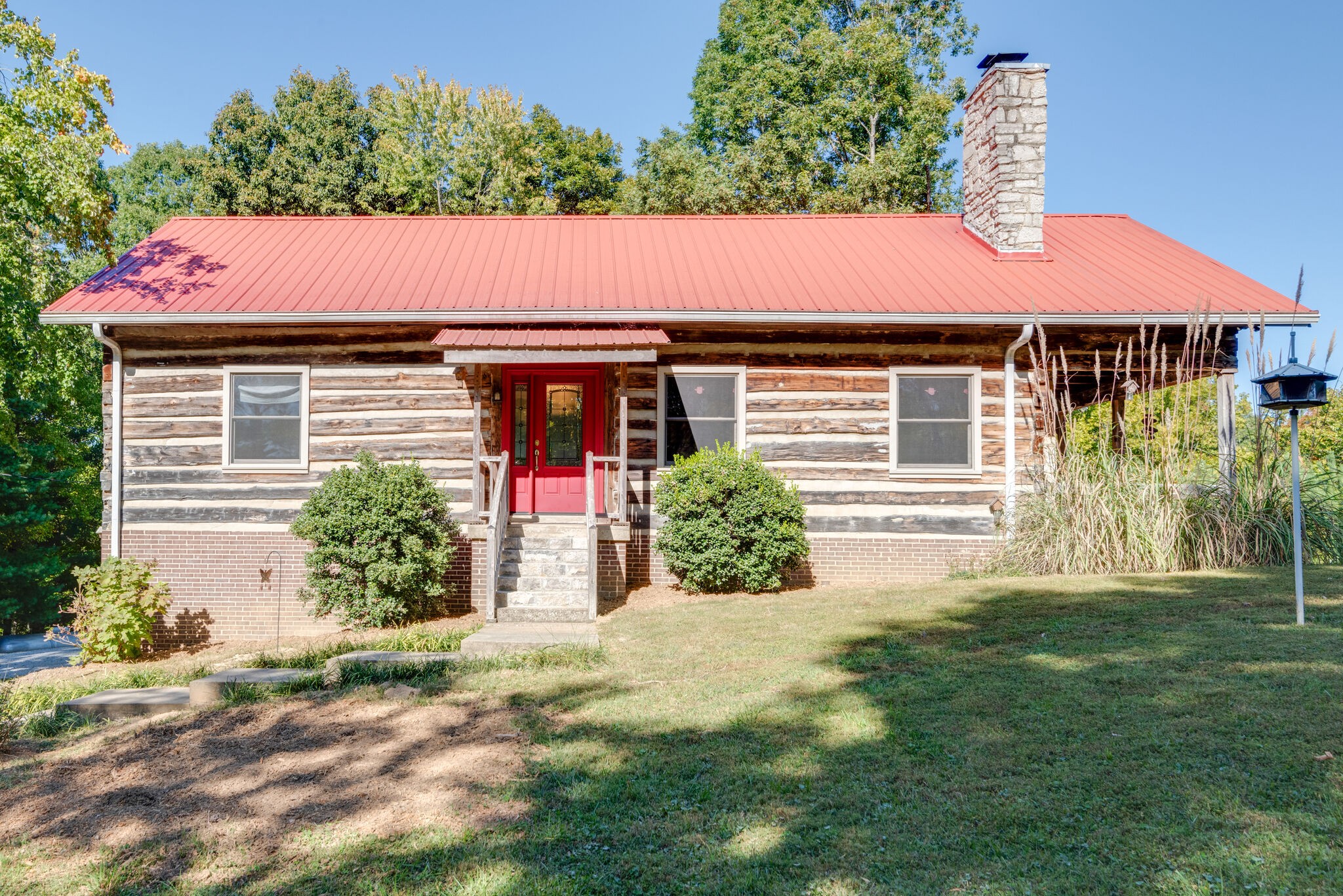 3093 Ivey Point Road Goodlettsville, TN 37072 - Photo 4 of 40 a small house with a tree in front of it