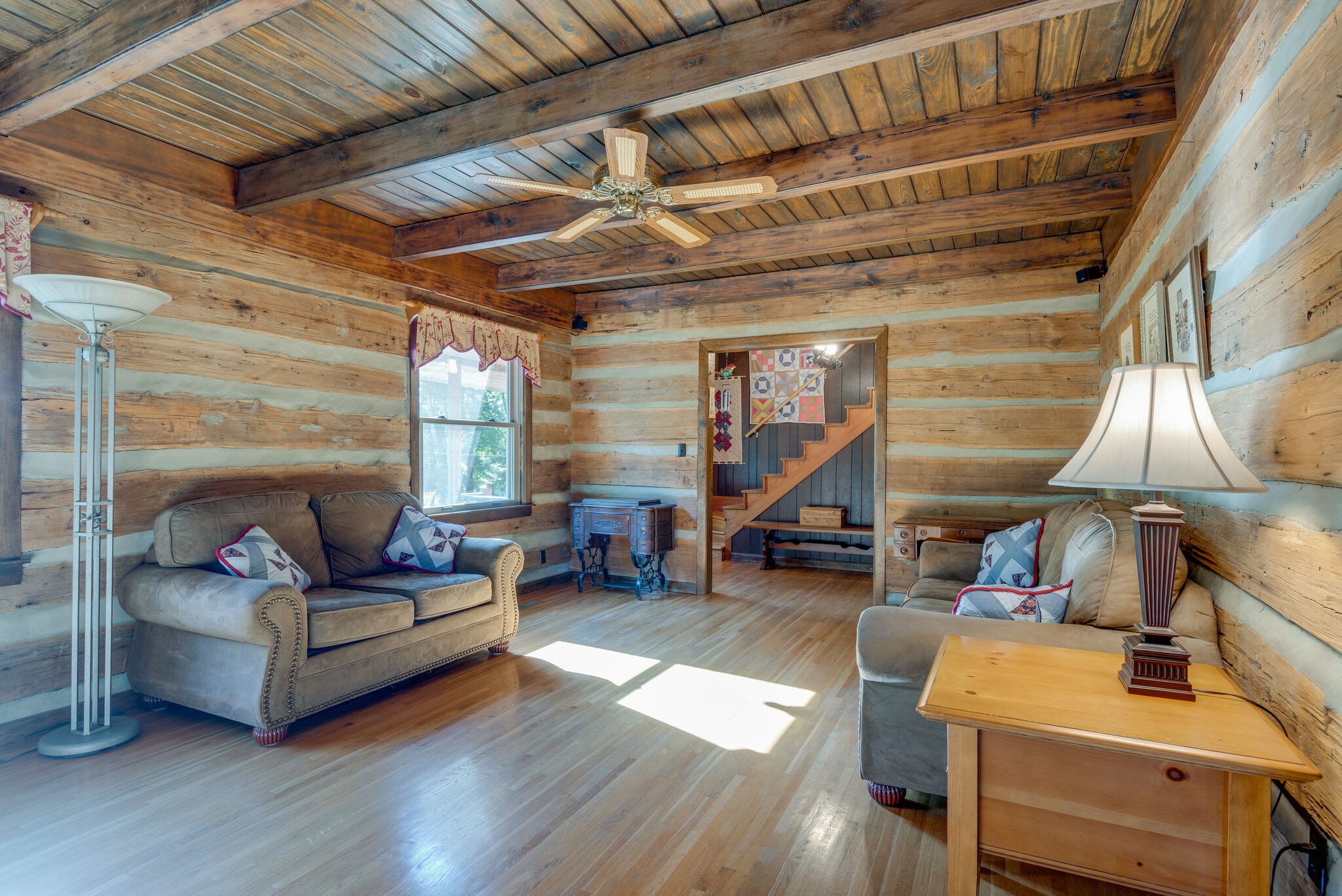 3093 Ivey Point Road Goodlettsville, TN 37072 - Photo 7 of 40 a living room with furniture and a wooden floor