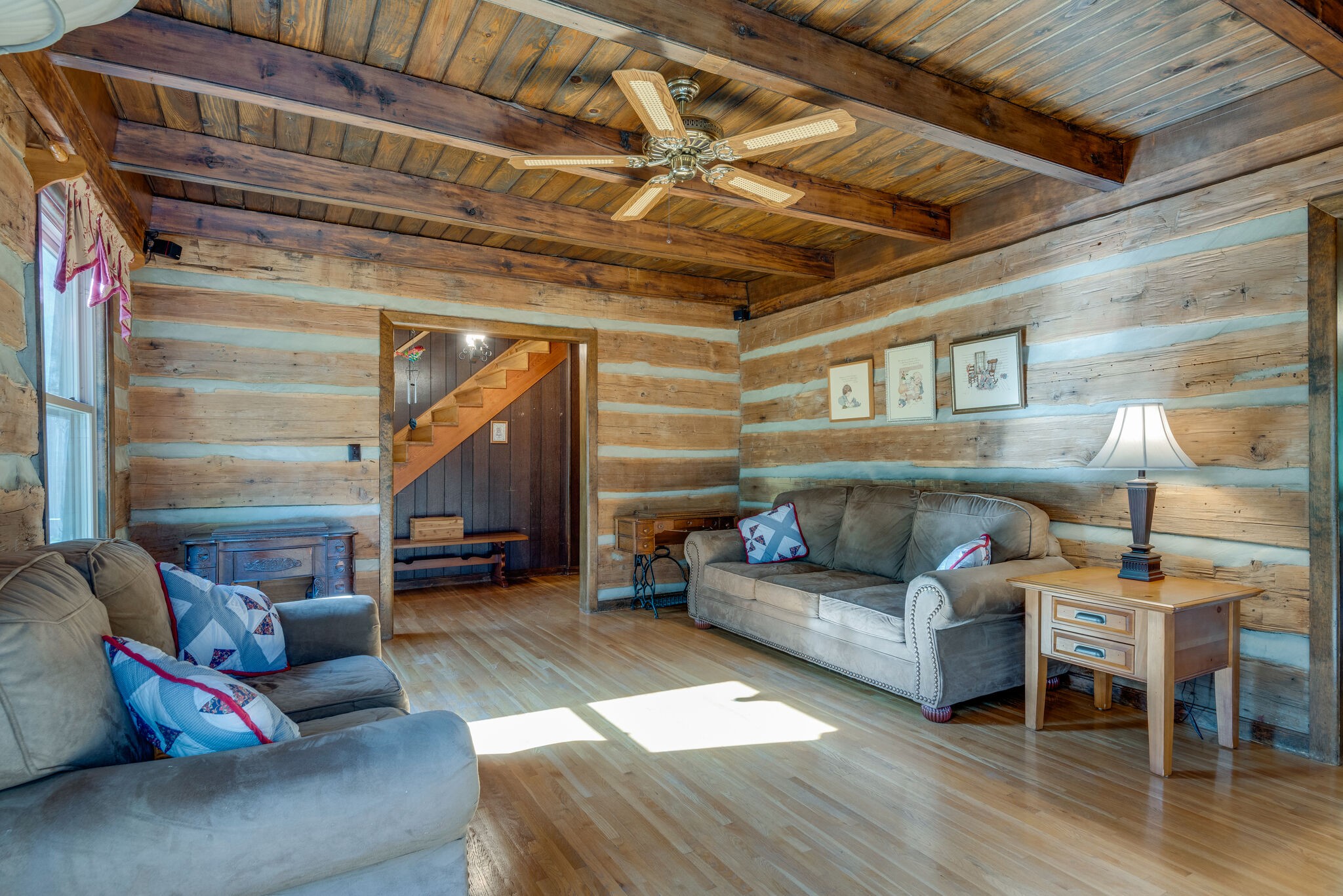 3093 Ivey Point Road Goodlettsville, TN 37072 - Photo 8 of 40 a living room with furniture and a wooden floor