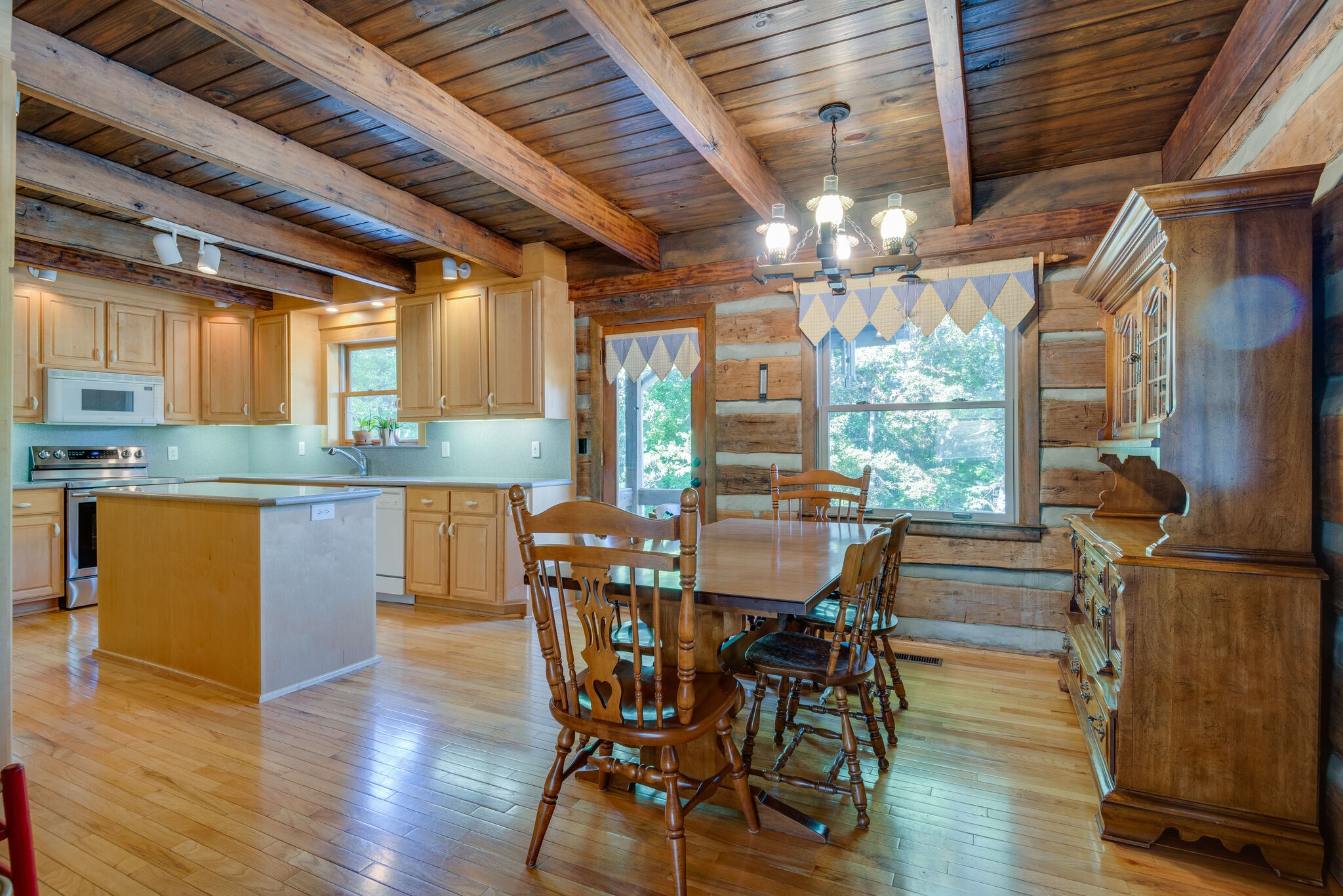 3093 Ivey Point Road Goodlettsville, TN 37072 - Photo 9 of 40 a view of a dining room with furniture window and wooden floor