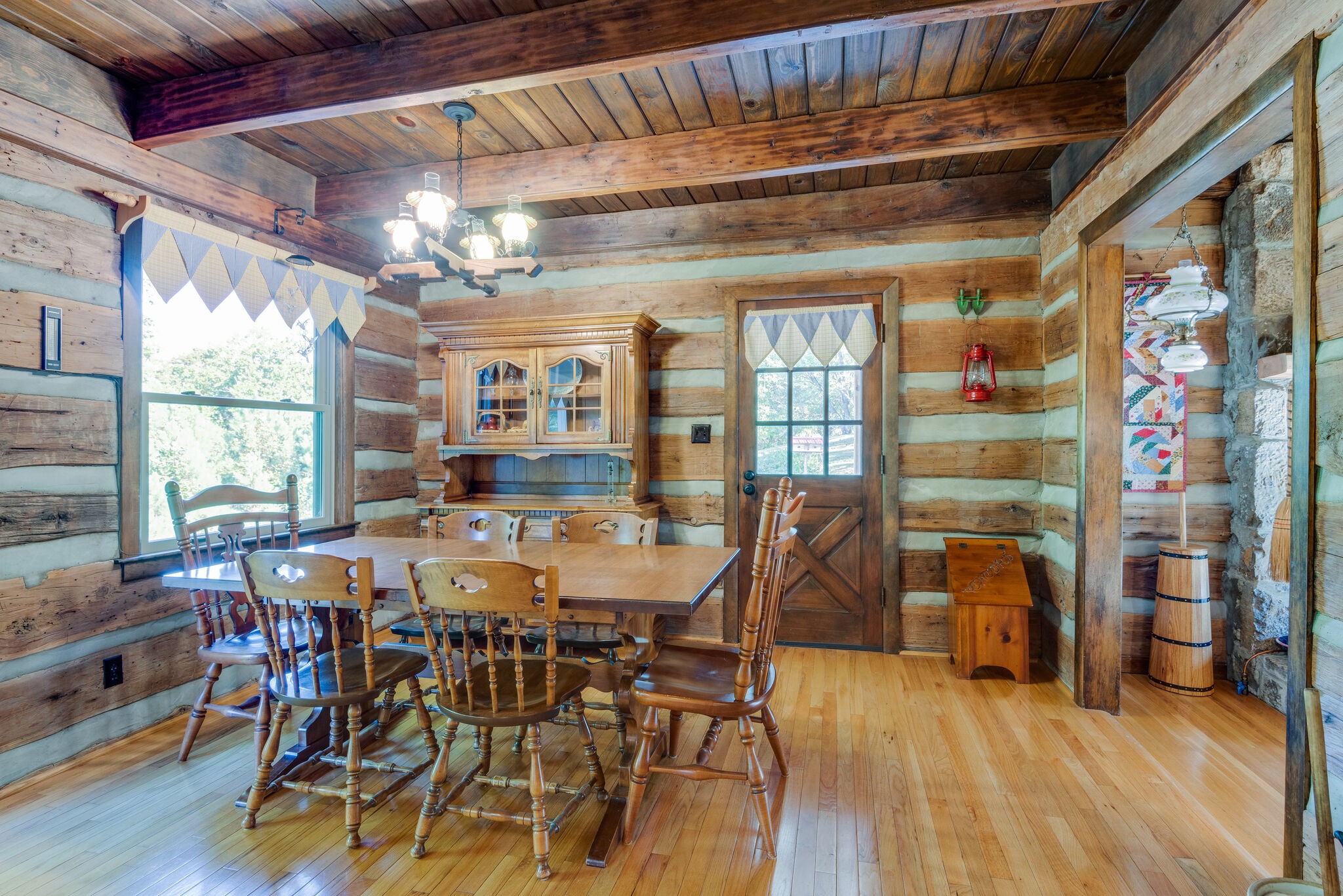 3093 Ivey Point Road Goodlettsville, TN 37072 - Photo 10 of 40 a view of a dining room with furniture window and wooden floor