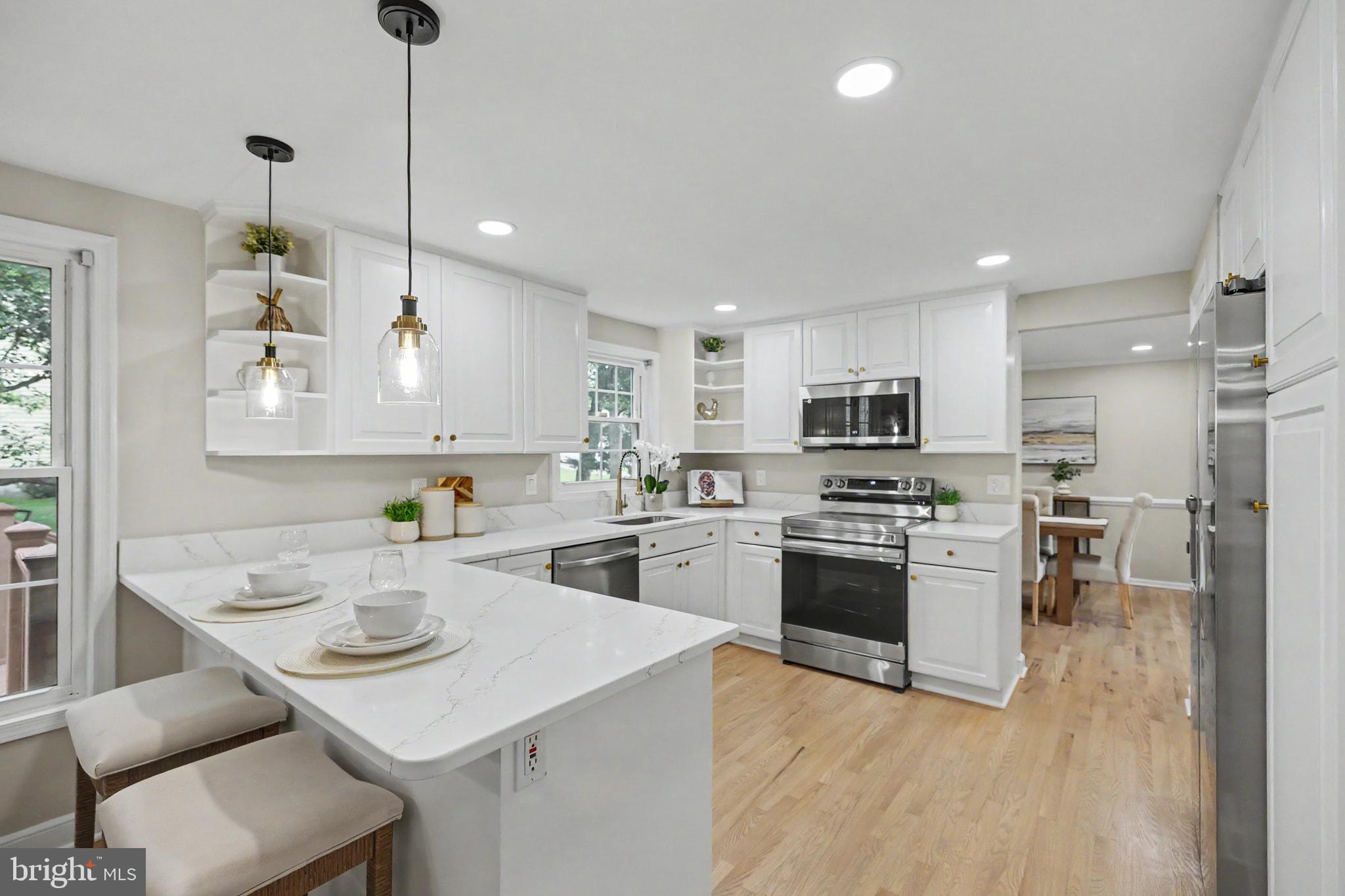 12555 Cross Country Lane Reston, VA 20191 - Photo 8 of 55 Bright and airy modern kitchen space.