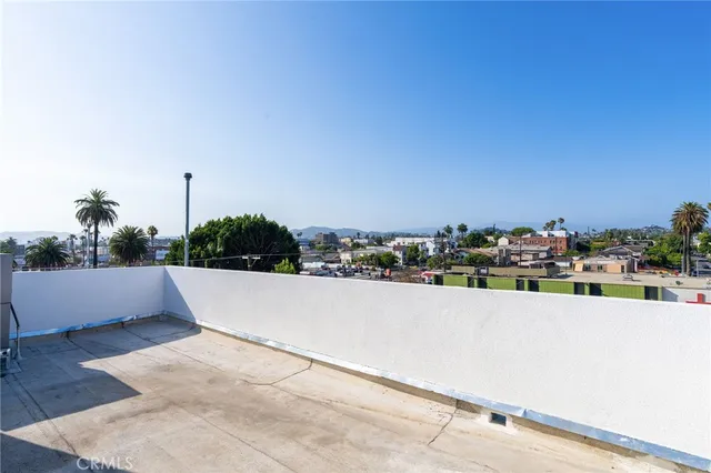 a view of a terrace with city view