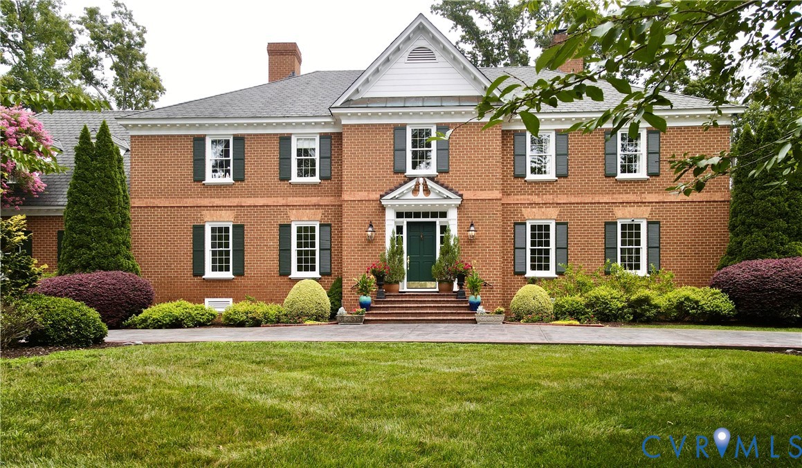 9006 Brieryle Road Henrico, VA 23229 - Photo 1 of 6 Traditional brick exterior featuring a prominent g