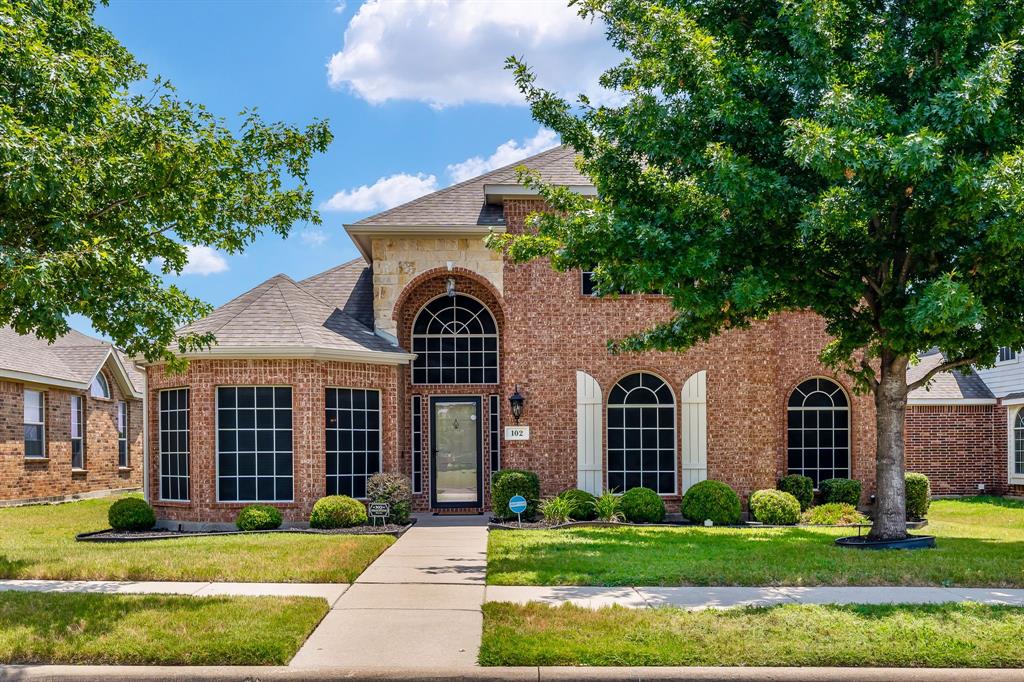 102 Paradise Way Red Oak, TX 75154 - Photo 1 of 1 View of front of property with a front yard