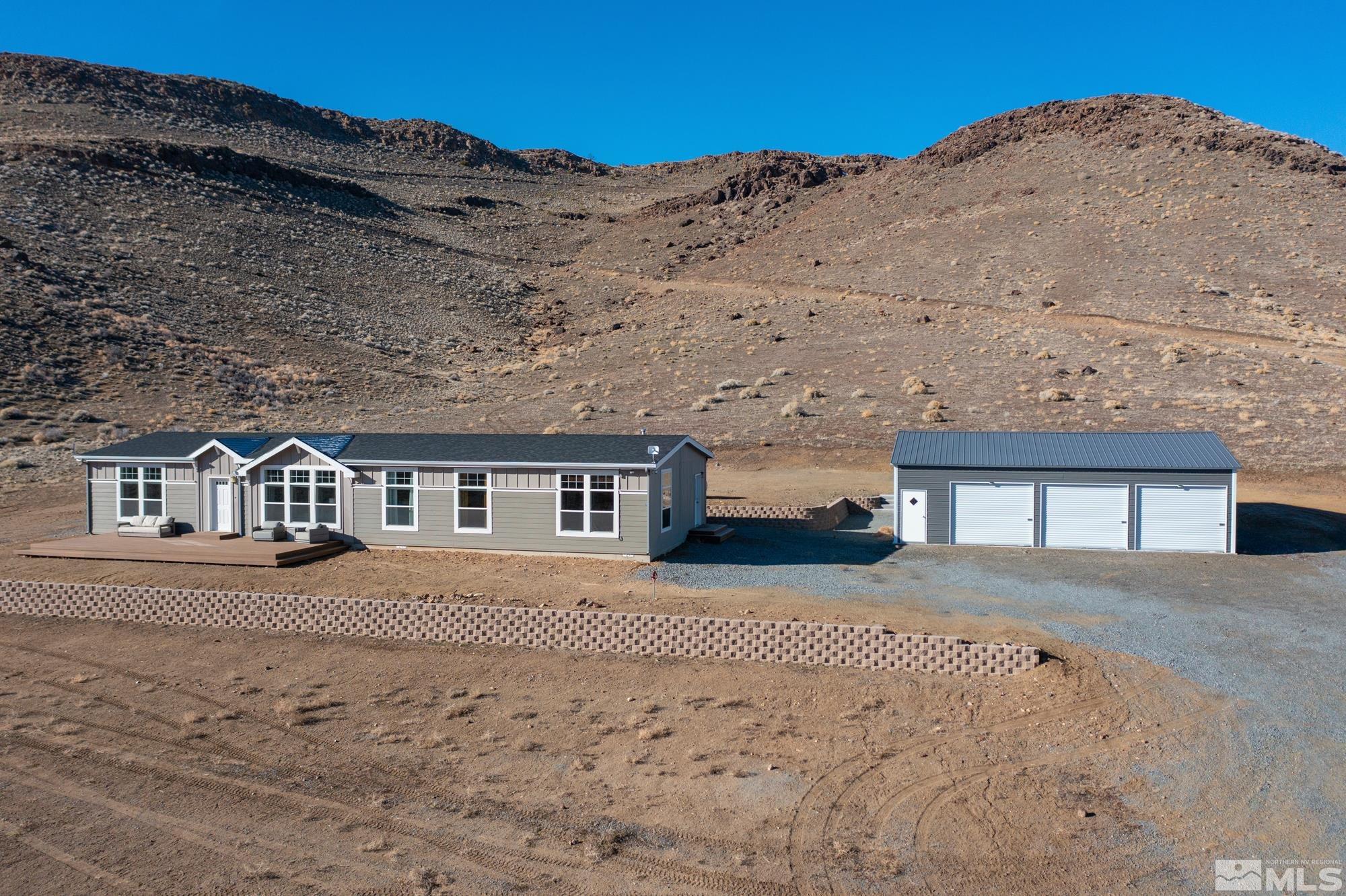 900 Ironwood Road Reno, NV 89510 - Photo 1 of 40 front view of a house with a yard