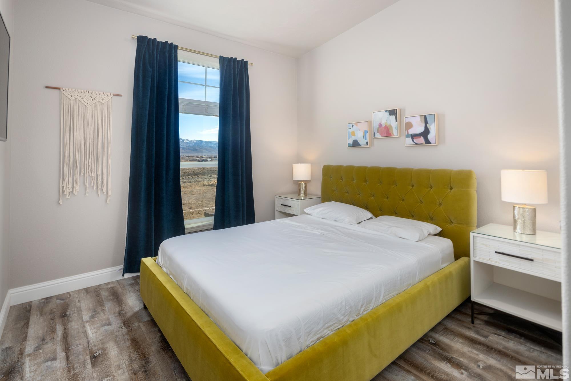 900 Ironwood Road Reno, NV 89510 - Photo 17 of 40 a bedroom with a bed and a window