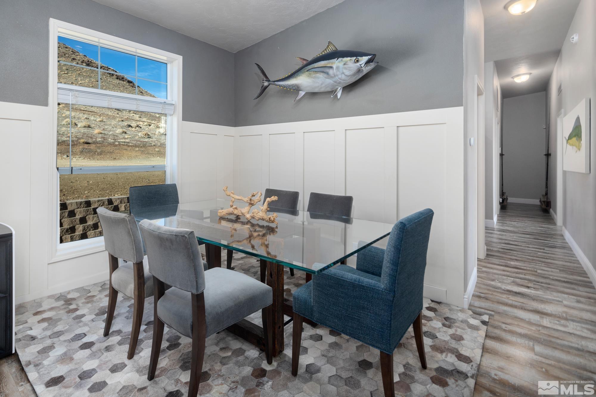 900 Ironwood Road Reno, NV 89510 - Photo 9 of 40 a view of a dining room with furniture and wooden floor