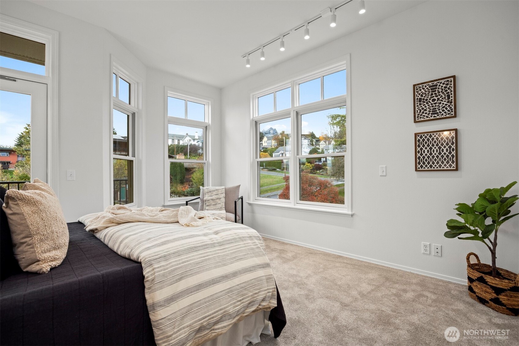 1201 13th Street, Unit 301 Bellingham, WA 98225 - Photo 21 of 38 a spacious bedroom with a bed and a window