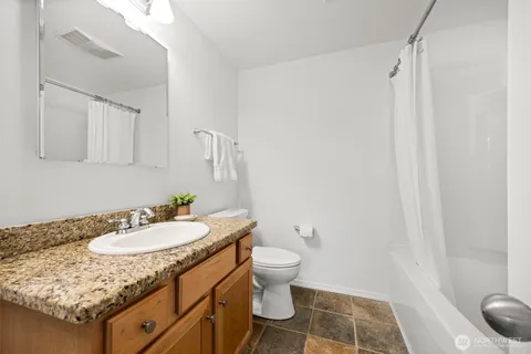 a view of washer and dryer in a utility room